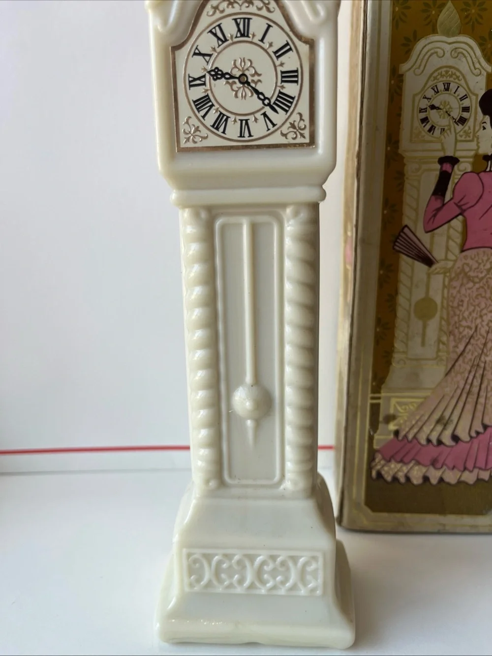 VTG Avon milk glass grandfather clock bird of paradise cologne fragrance hours